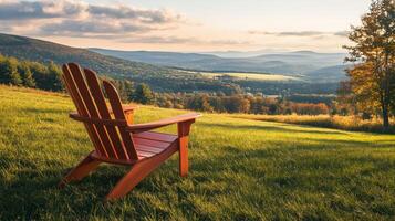 Chair on a Grassy Hillside with Scenic View photo