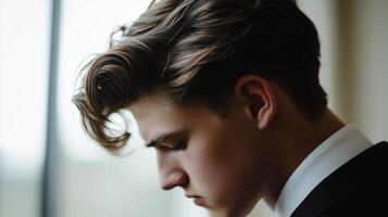 A young man with styled hair portrait photo