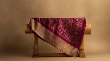 A traditional Banarasi sari in rich burgundy photo