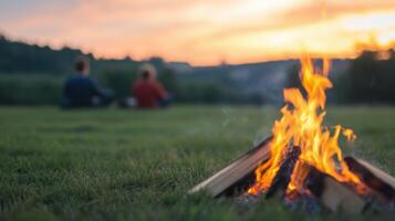 Family Enjoying Evening Campfire Outdoors in Scenic Sunset Nature Setting with Relaxation and Togetherness in Warm Light Landscape for Cozy and Memorable Holiday Retreat photo