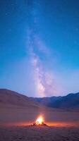 Nighttime Starry Sky in Desert Canyon with Campfire Under Milky Way Vertical View photo