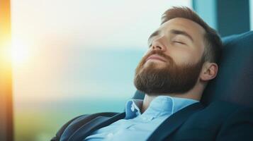 Businessman Relaxing in Lounge After Successful Day with Sunlit Backdrop and Comfortable Setting photo