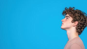High School Student with ADHD in Profile Against Blue Background Exhibiting Focus and Achievement in Academic Setting photo