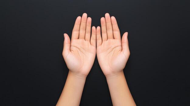 Open Palms of Hands on Black Background Showcasing Trust and Protection Concept Close Up in Minimalist Style with Copy Space for Design Projects and Mindfulness Themes in Stock Photography photo