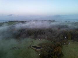 Fog rolling over teignmouth countryside at dawn photo