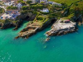 Aerial view of newquay harbor showing turquoise water and kayaks photo