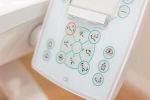 Modern dental chair control panel showing different positions and functions photo