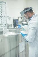 Scientist working with liquid nitrogen in bio laboratory photo