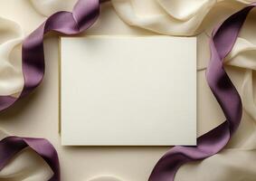 Elegant blank invitation card surrounded by luxurious ribbons on a soft background photo
