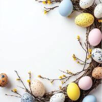 Decorative easter eggs arranged creatively with branches and flowers photo