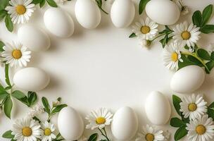 Decorated white eggs and daisies arranged in a circular pattern on a light background photo