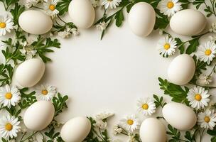 Fresh white eggs surrounded by daisies and greens on a light background for spring decoration photo