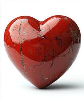 Heart-shaped decorative object with glossy red surface and intricate marbling details photo