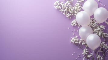 Elegant white balloons arranged with delicate flowers on a soft purple background for a celebration photo