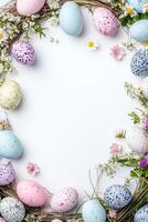Colorful Easter eggs arranged with flowers in a decorative display for spring celebrations photo