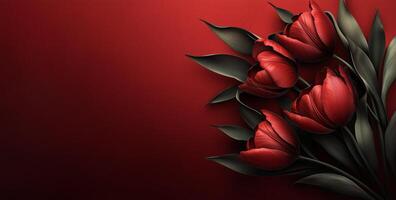 Red tulips arranged artistically on a deep red background with green leaves photo