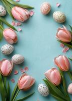 Spring celebration with pink tulips and decorated eggs on a pastel background photo