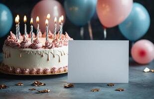 Birthday cake with candles and balloons at celebration event in cozy indoor setting photo