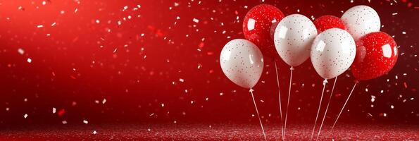 Balloons in red and white with confetti backdrop for a festive celebration event photo