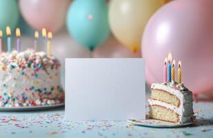 Birthday celebration with cake, balloons, and a blank card for messages photo