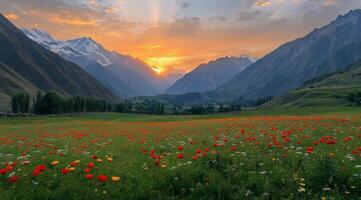 Majestic sunset over a valley filled with vibrant flowers and mountains in the background photo