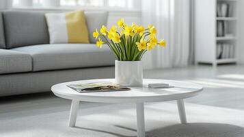 Bright daffodils in a modern living room with a cozy gray sofa and natural light photo