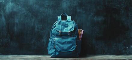 Backpack with school supplies in a classroom setting at a modern educational facility photo