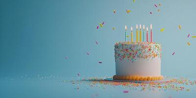 Colorful birthday cake with candles and confetti on blue background photo