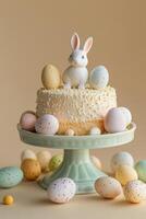 Spring celebration cake with bunny and decorated eggs on a pastel background photo