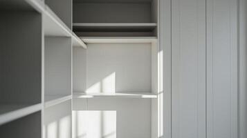 Minimalist interior with open shelving and soft sunlight illuminating the room photo