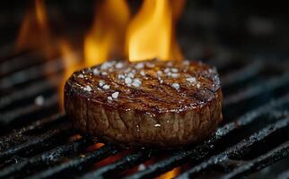 Grilling a perfectly seared steak over hot flames at a backyard barbecue event photo