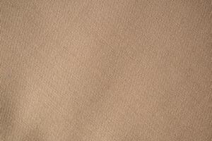 flat view Light brown pattern fabric texture background. photo