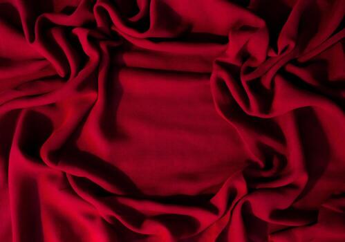 Red fabric wavy crumpled abstract background fabric texture with copy space. photo