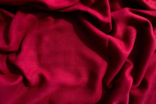 abstract background texture Red fabric wavy crumpled with copy space. photo