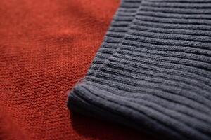 Close up dark grey knitted fabric background. photo