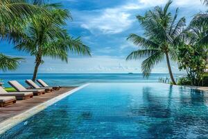 Beautiful luxury swimming pool in hotel pool resort - Boost up color Processing photo