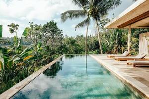 Swimming pool in luxury hotel resort photo
