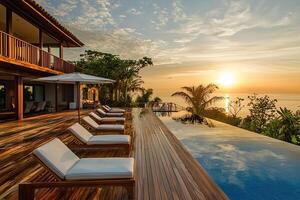 Sunset at the luxury villa on the beach photo