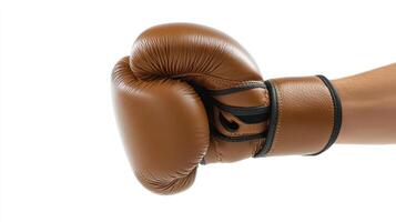 The boxing glove is poised and ready, symbolizing dedication and strength in the ring photo