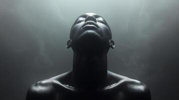 A serene individual embraces tranquility while surrounded by soft light and shadows photo