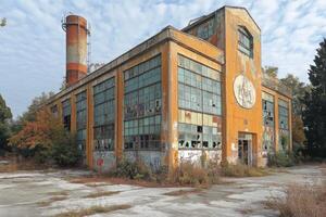 Abandoned Factory Building Shows Decay and Time photo