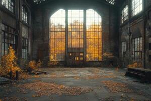 Autumn Light Illuminates Abandoned Factory Interior photo