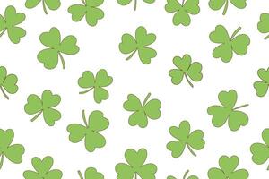 Seamless pattern of clover leaves for St. Patrick's Day. Green clover leaves in doodle style on white background. Design for wrapping paper, wallpaper, background, card and decoration. vector