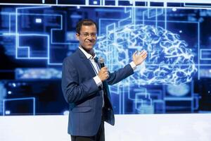 Smiling specialist talking at AI tech summit event gathering professionals seeking to discover latest AI solutions. Happy speaker presents how can AI be leveraged to accelerate innovation photo