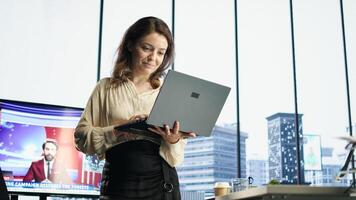 Female CEO leader working on financial planning and budget allocation, ensuring the company resources are used effectively to achieve maximum profit and long term objectives in office. Camera A. photo