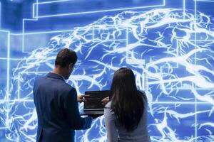 Engineers using devices and AI neural networks modeled after human brain to solve complex problems. Workers using artificial intelligence deep learning to look at data and complete tasks photo