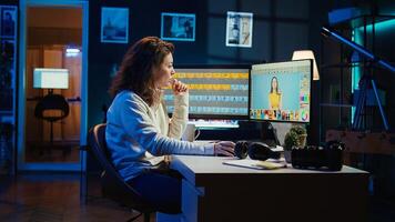Photographer using professional photo editing tools on PC display. Photo editor utilizing high tech photographs retouching application to make adjustments using computer screen, camera B
