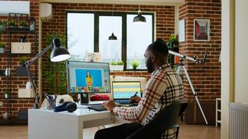 Freelance graphic designer editing photos on a modern computer setup in a remote office. Ideal workspace for a digital design professional, retouching digital pictures from home. Camera A.