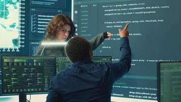 Cyber security experts team working on encryption and IT security in a governmental agency. Specialists working on cyber operations, network security and data protection for national safety. Camera A. photo