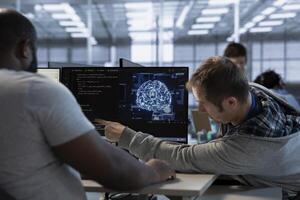 Team of admins does data center workplace automation using AI and machine learning tools. Teamworking colleagues integrating artificial intelligence driven automation in server hub facility operations photo